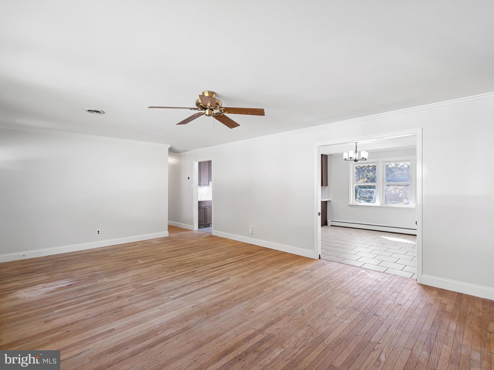 1802 Hettering Road Wilmington, DE 19810 - Photo 10 of 29 a view of empty room with wooden floor and fan