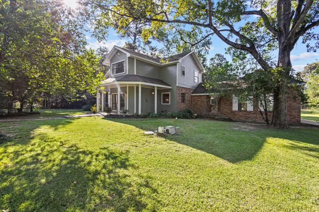 a view of a house with a swimming pool