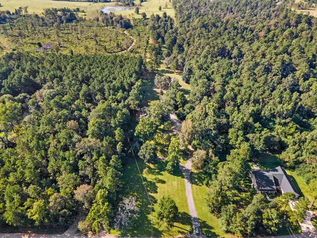 a view of a golf course with a lake