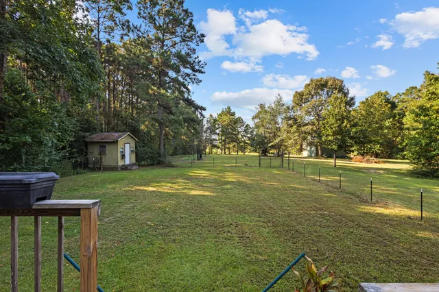 a view of a golf course with a lake