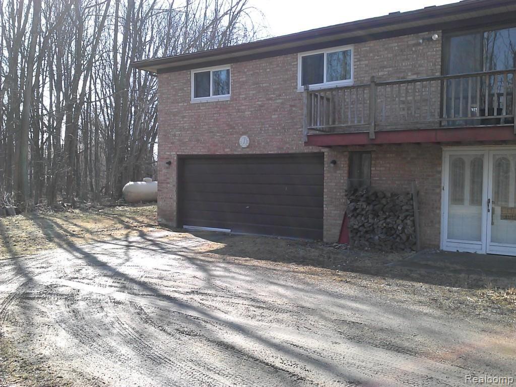9260 Springborn Road Casco, MI 48064 - Photo 6 of 29 propane tank-garage.jpg