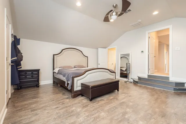a view of a patio with dining table and chairs and potted plants