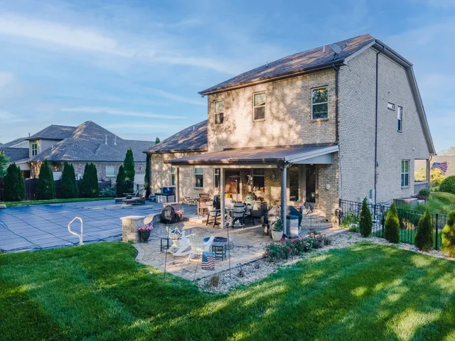 a front view of a house with a porch