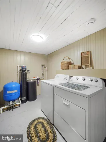 a bathroom with a sink double vanity and a mirror