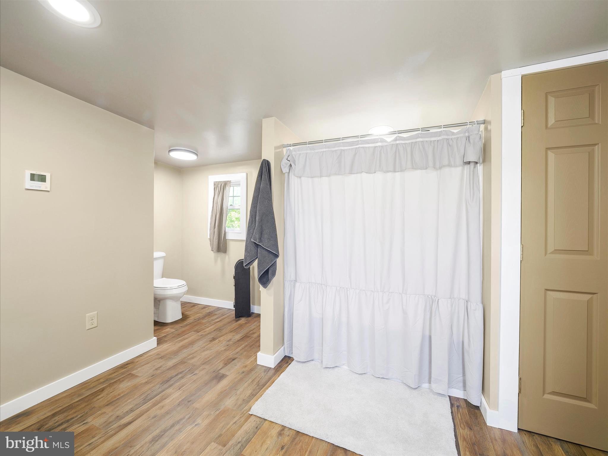 19031 Back Road Dry Run, PA 17220 - Photo 34 of 46 a bathroom with a sink and a toilet