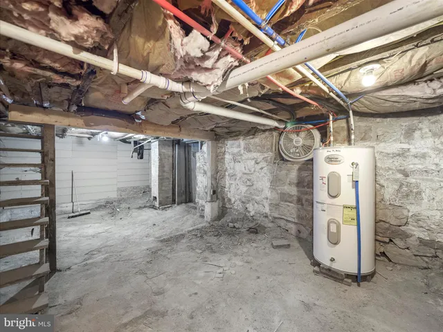 a view of a room with wooden walls