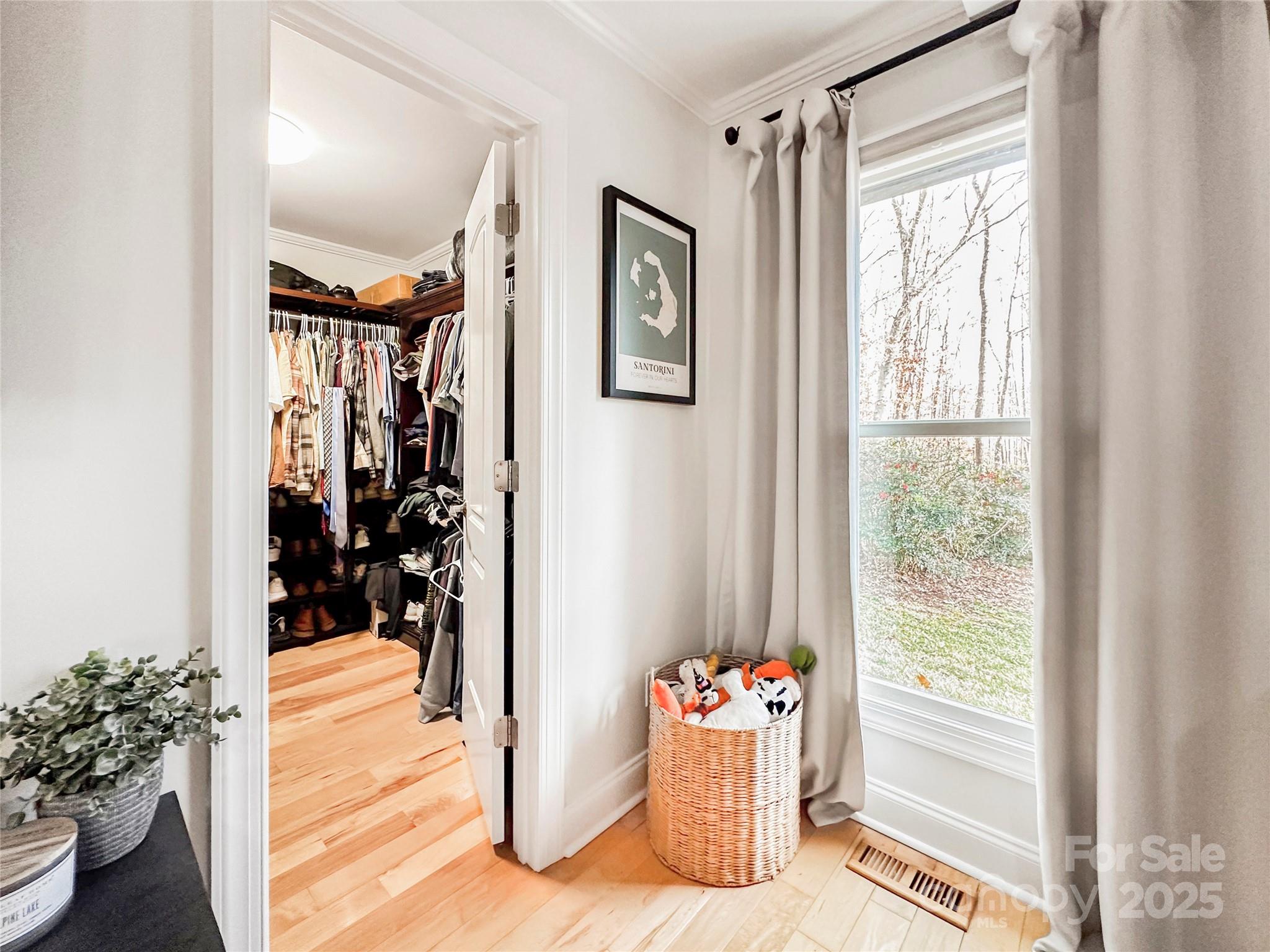 9501 Bartlett Road Mint Hill, NC 28227 - Photo 31 of 48 a view of an entryway with wooden floor and a livingroom