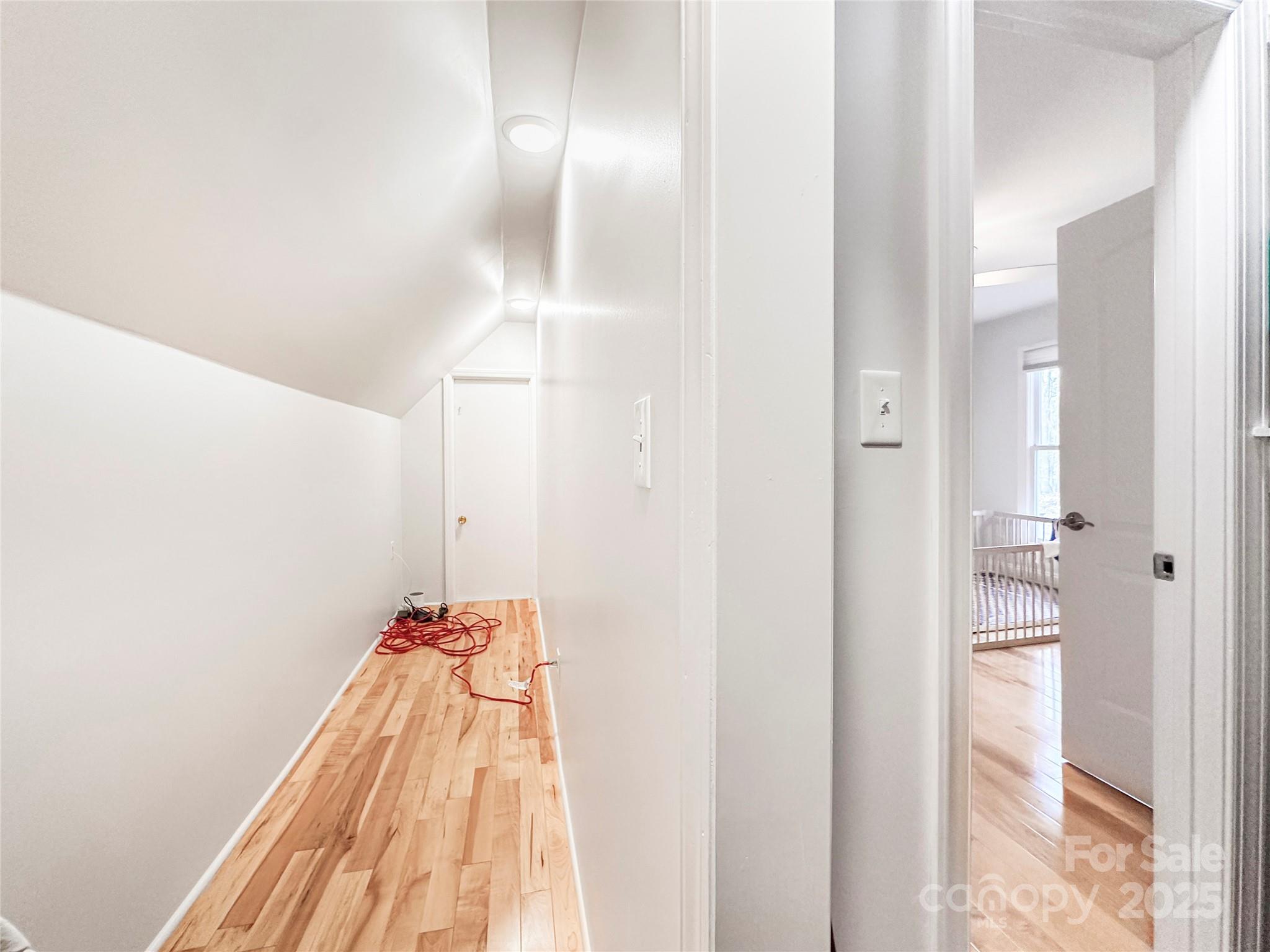 9501 Bartlett Road Mint Hill, NC 28227 - Photo 37 of 48 a view of a room with wooden floor