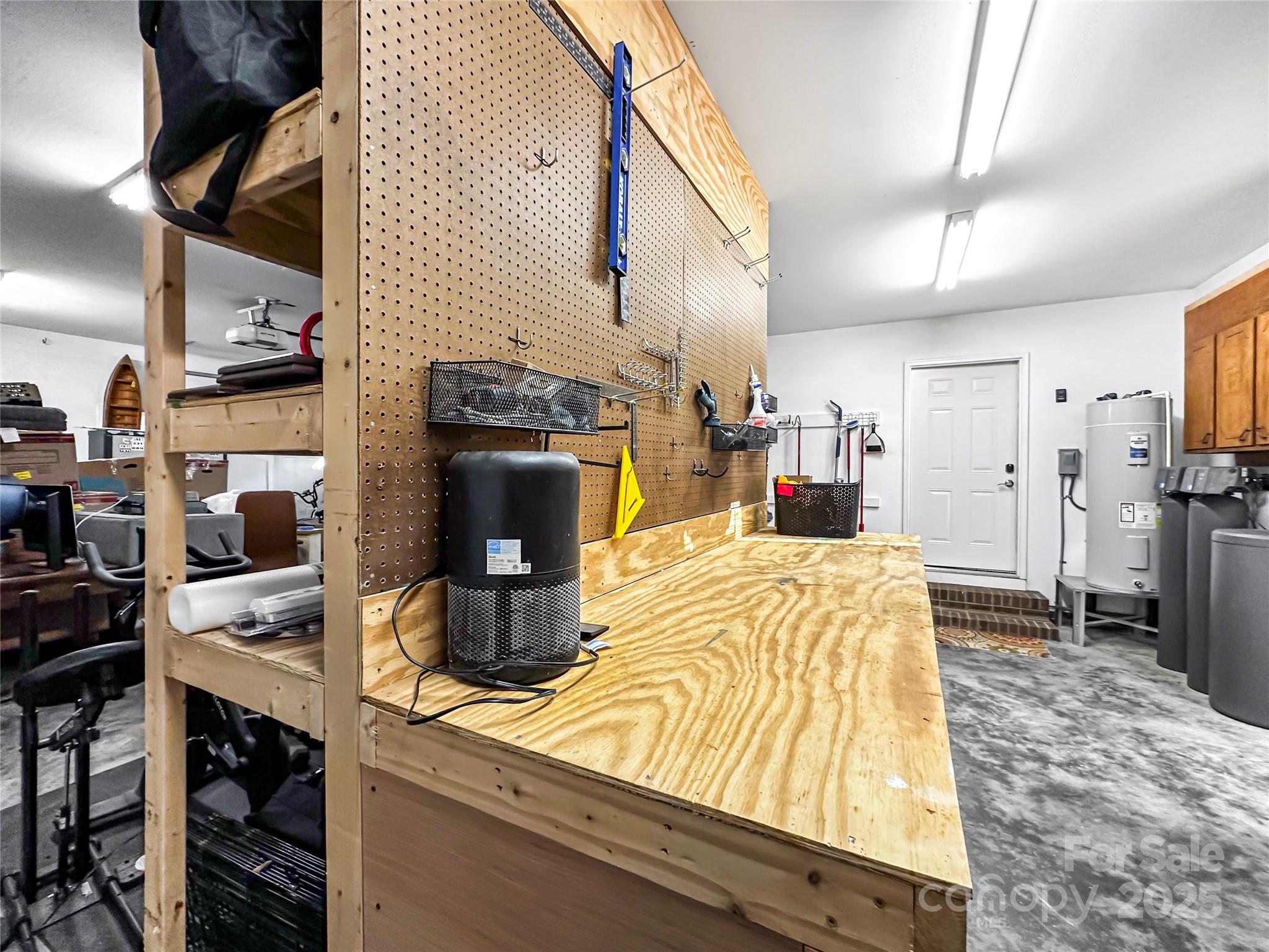 9501 Bartlett Road Mint Hill, NC 28227 - Photo 42 of 48 a bed room with a bed and a television