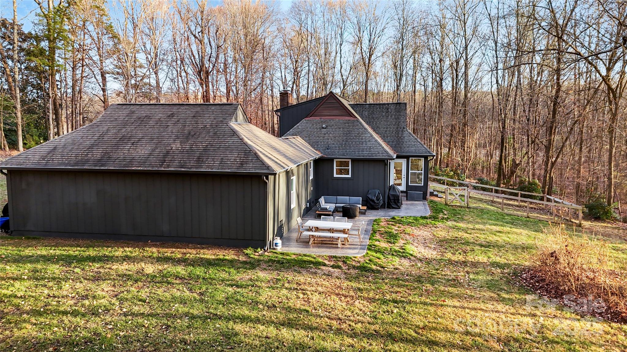 9501 Bartlett Road Mint Hill, NC 28227 - Photo 8 of 48 a backyard of a house with table and chairs