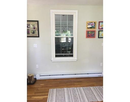 36 Overlook Road Arlington, MA 02474 - Photo 17 of 26 a view of a hardwood floor and wardrobe