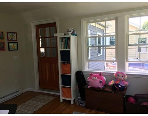 36 Overlook Road Arlington, MA 02474 - Photo 21 of 26 a bedroom with a bed dresser and a window