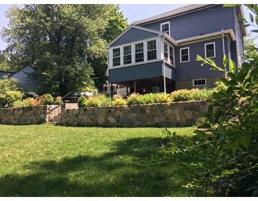 36 Overlook Road Arlington, MA 02474 - Photo 5 of 26 a front view of a house with a garden
