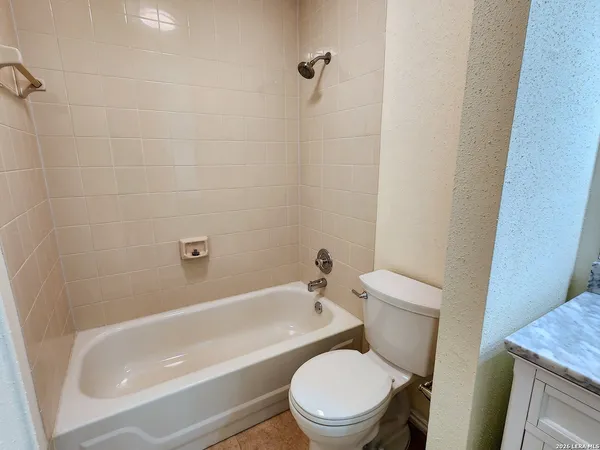 a view of a kitchen with furniture and a kitchen