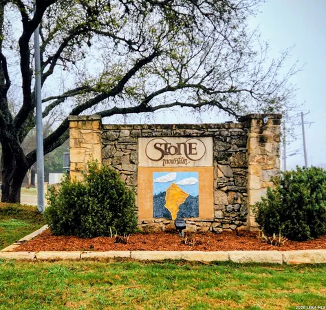 a view of a building with a yard