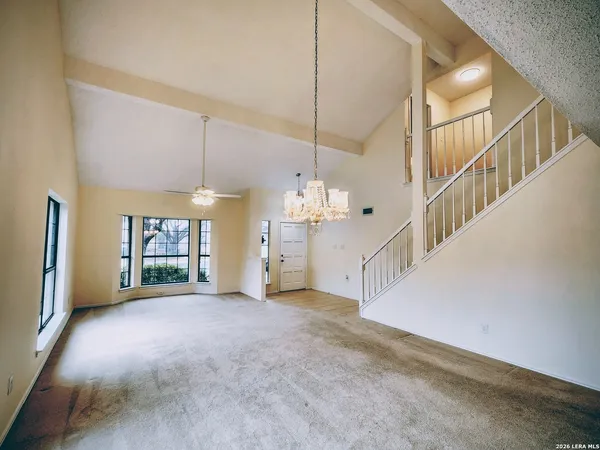 a view of a livingroom with a staircase