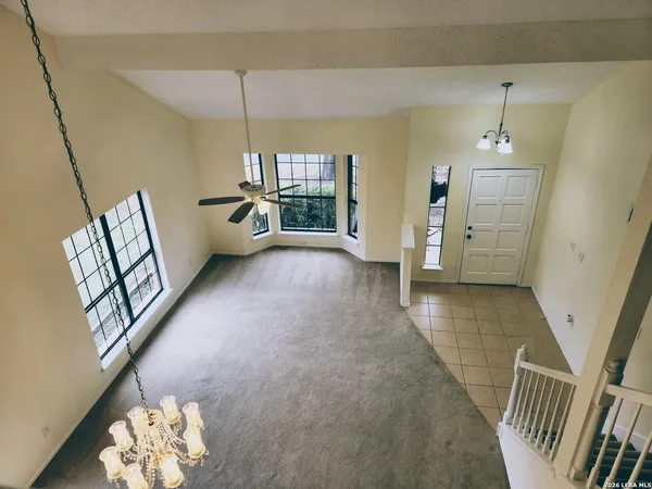 a view of livingroom with furniture and window
