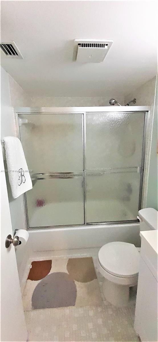 250 Gate Road, Unit 160 Hollywood, FL 33024 - Photo 12 of 33 a bathroom with a toilet and a shower