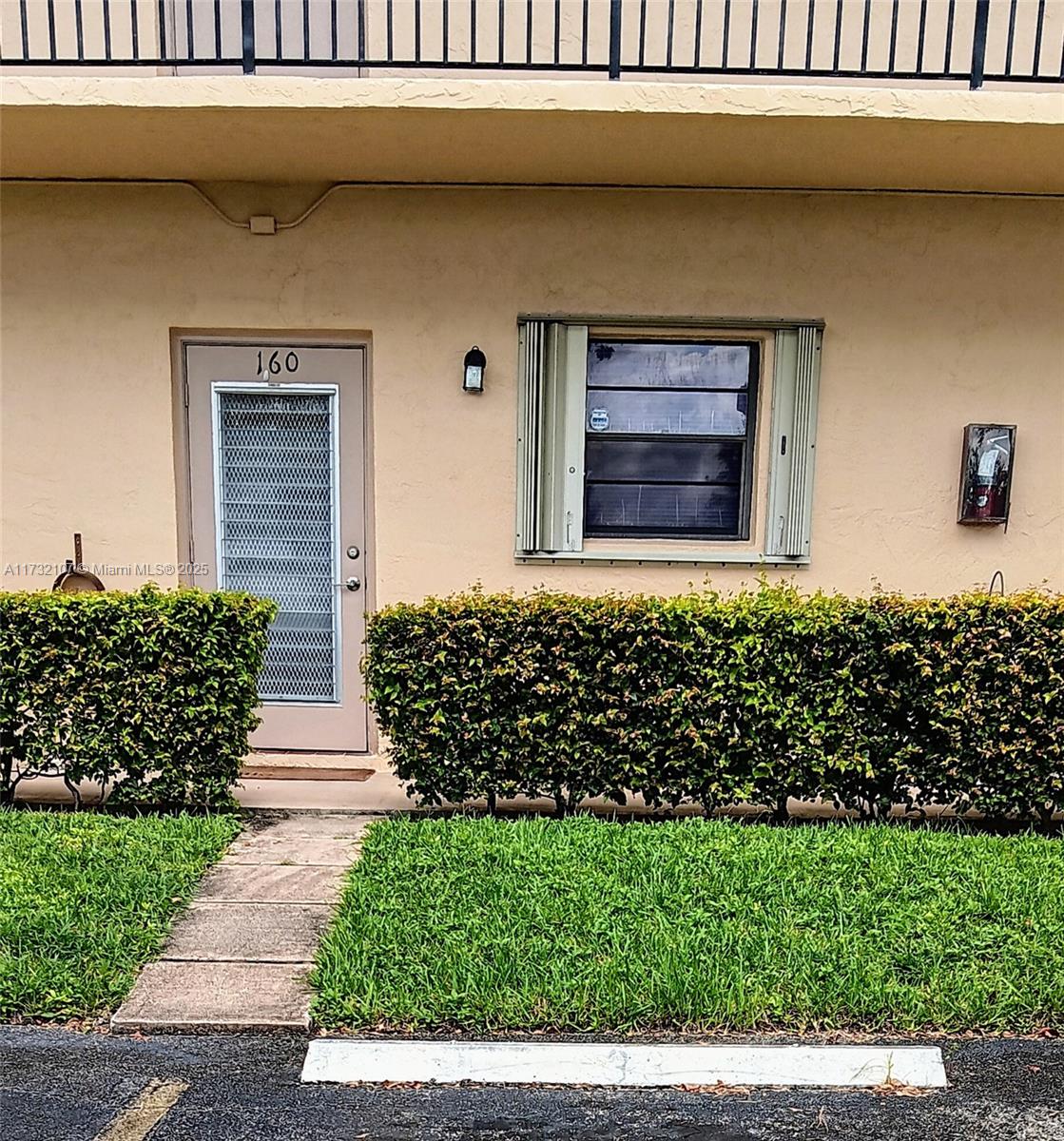 250 Gate Road, Unit 160 Hollywood, FL 33024 - Photo 14 of 33 a front view of a house