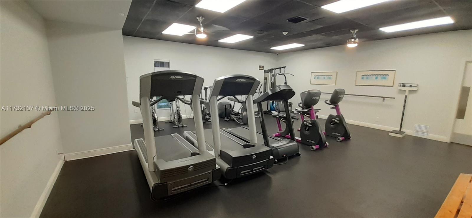 250 Gate Road, Unit 160 Hollywood, FL 33024 - Photo 22 of 33 a view of a room with gym equipment
