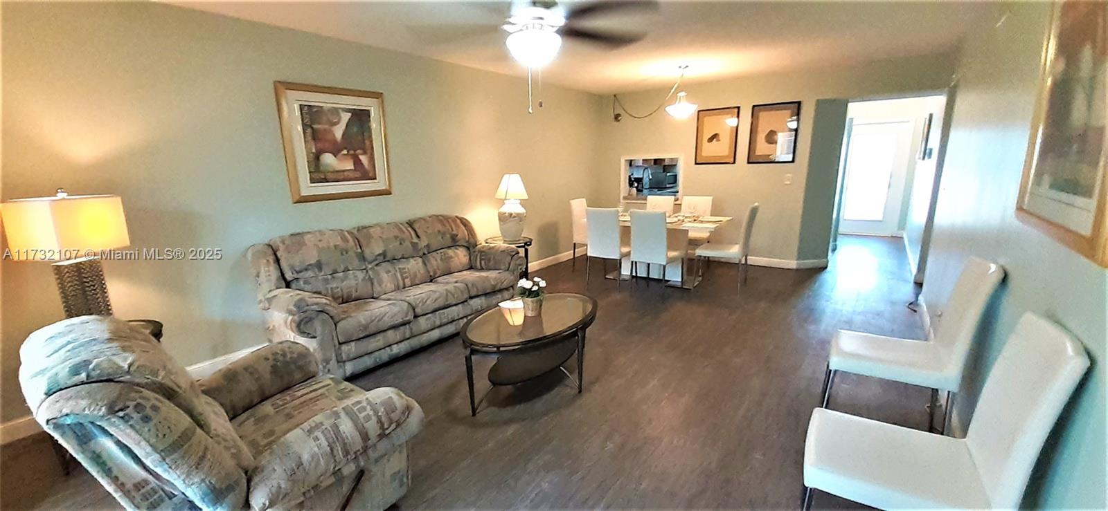 250 Gate Road, Unit 160 Hollywood, FL 33024 - Photo 5 of 33 a living room with furniture and a couch