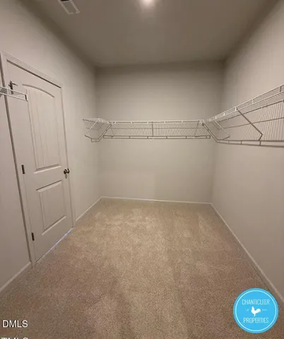 a view of a room with racks on the wall