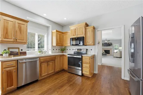 $410,000 | 2440 West 137th Place, Leawood, KS 66224