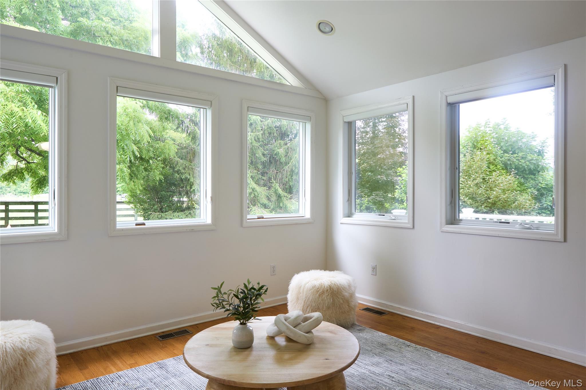 2039 Salt Point Turnpike Salt Point, NY 12578 - Photo 11 of 35 a dining room with a window and wooden floor
