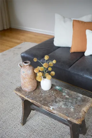 a vase of flowers sitting on a table
