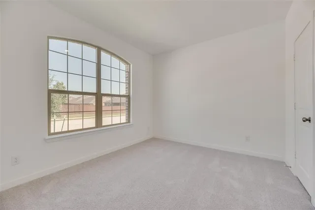 a white tub sitting next to a bathroom sink
