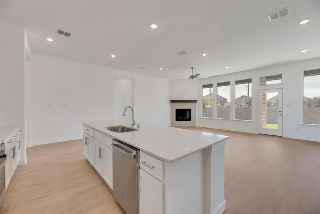 a view of a house with backyard porch and garden
