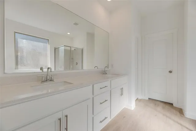 a view of a livingroom with a ceiling fan and window