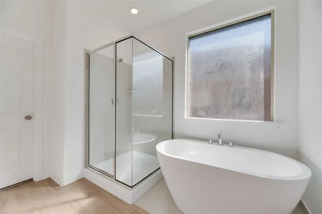 a bathroom with double sink and a mirror