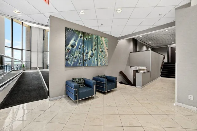 a view of swimming pool with outdoor seating