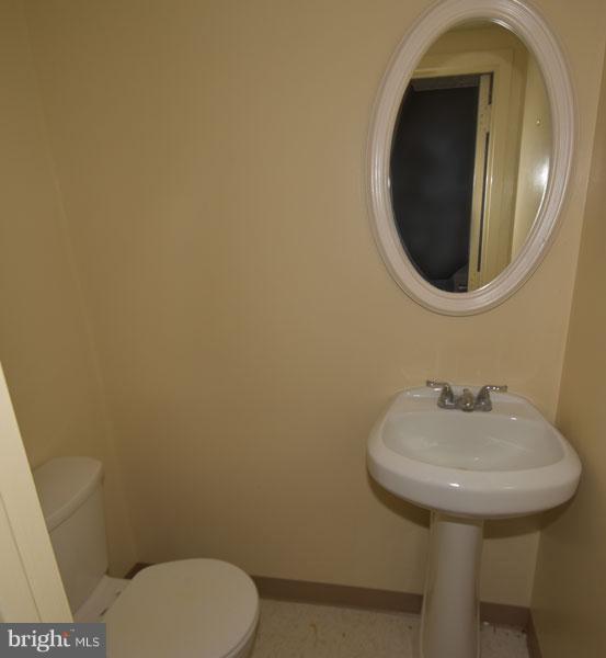 16 Tabiona Court Silver Spring, MD 20906 - Photo 12 of 12 a bathroom with a toilet sink and mirror
