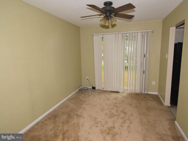 16 Tabiona Court Silver Spring, MD 20906 - Photo 3 of 12 wooden floor in an empty room