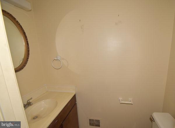 16 Tabiona Court Silver Spring, MD 20906 - Photo 5 of 12 a bathroom with a sink and a mirror