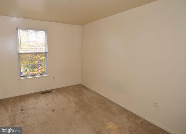 16 Tabiona Court Silver Spring, MD 20906 - Photo 7 of 12 an empty room with windows