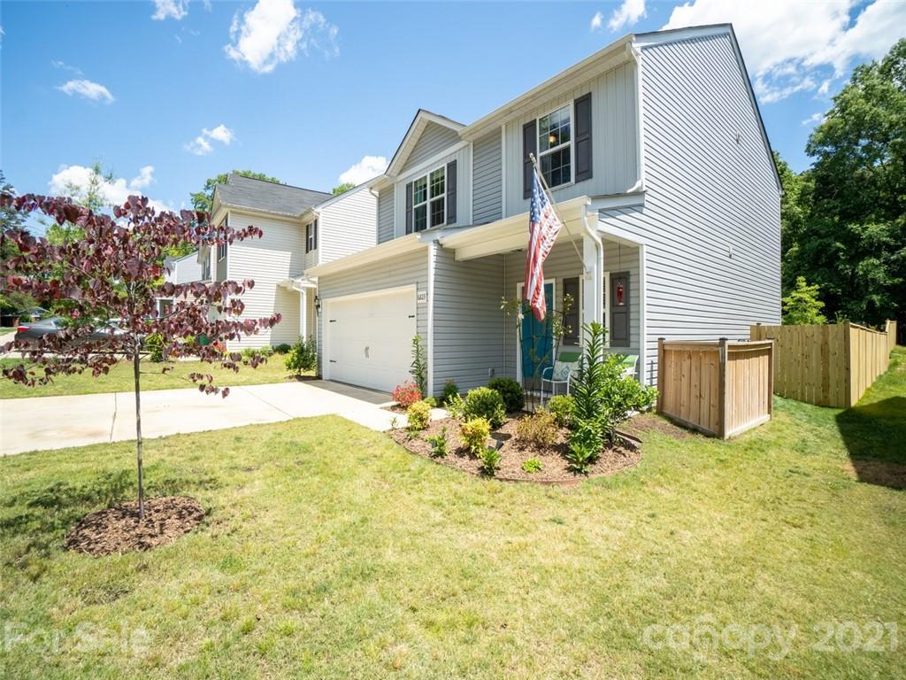 6823 Ware Road Charlotte, NC 28212 - Photo 3 of 47 a front view of a house with a yard