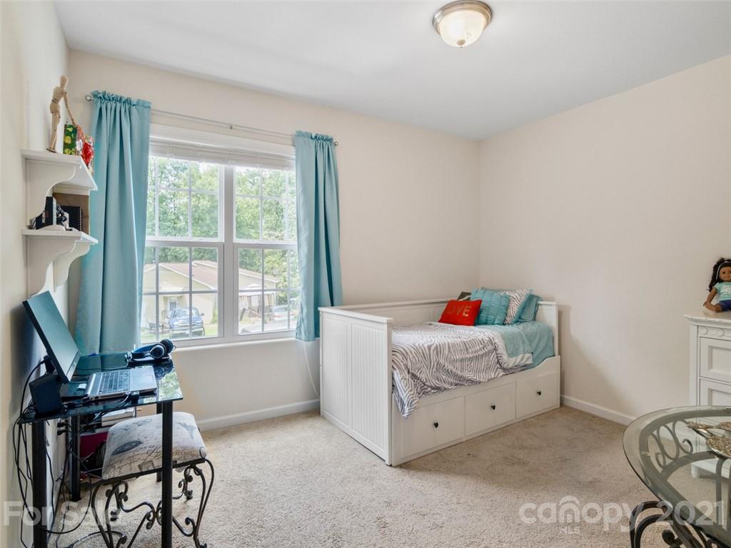 6823 Ware Road Charlotte, NC 28212 - Photo 28 of 47 a living room with furniture and a window