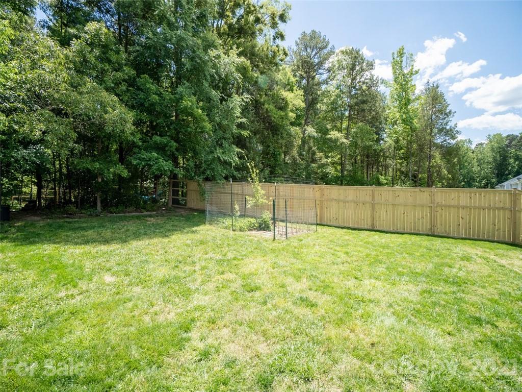 6823 Ware Road Charlotte, NC 28212 - Photo 41 of 47 a view of a backyard