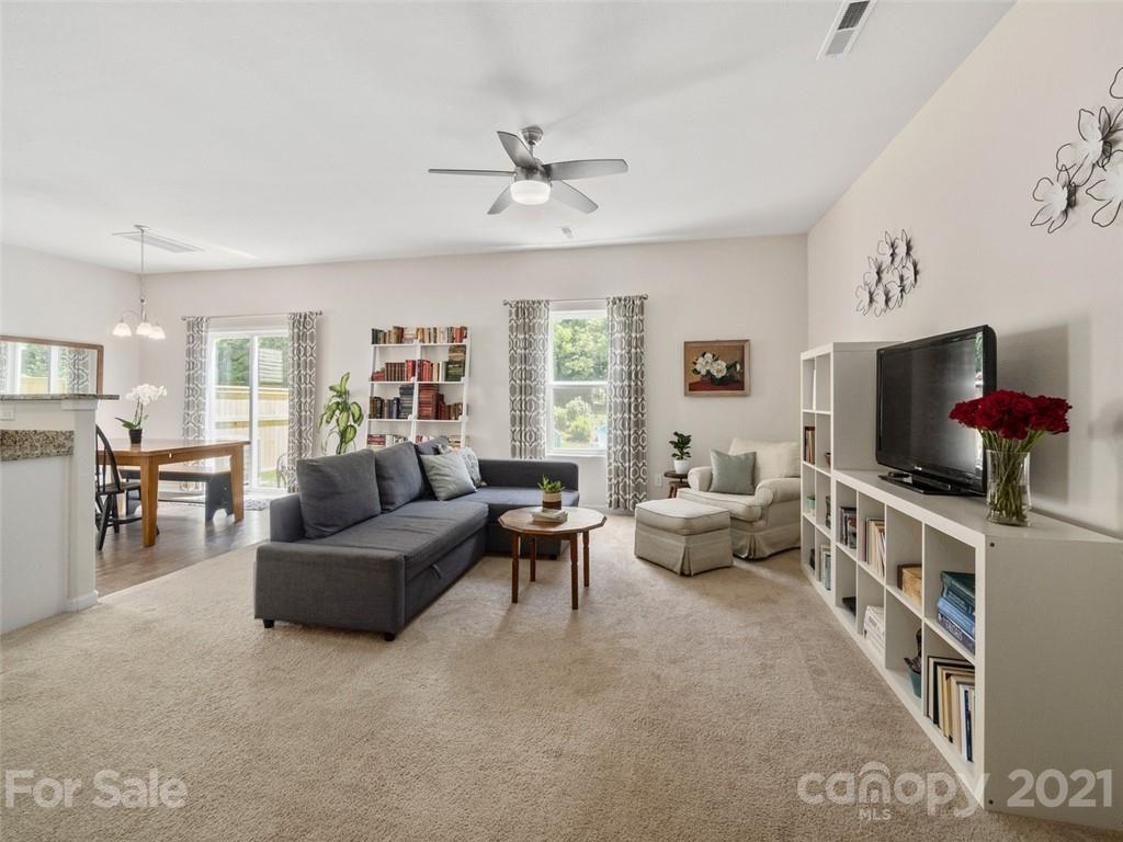 6823 Ware Road Charlotte, NC 28212 - Photo 7 of 47 a living room with furniture and a flat screen tv