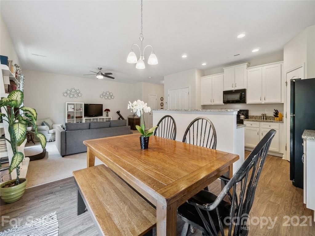 6823 Ware Road Charlotte, NC 28212 - Photo 10 of 47 a view of a dining room with furniture