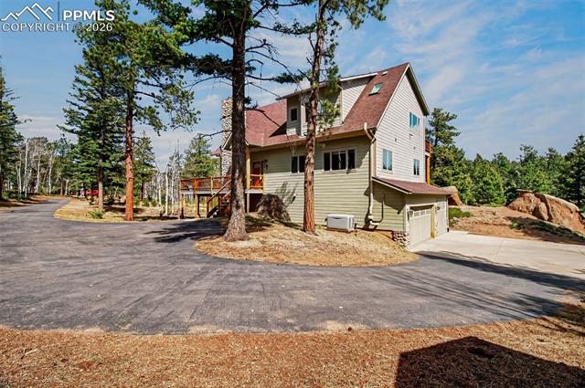 255 Summit Road Manitou Springs, CO 80829 - Photo 41 of 48 Front of this gorgeous mountain home