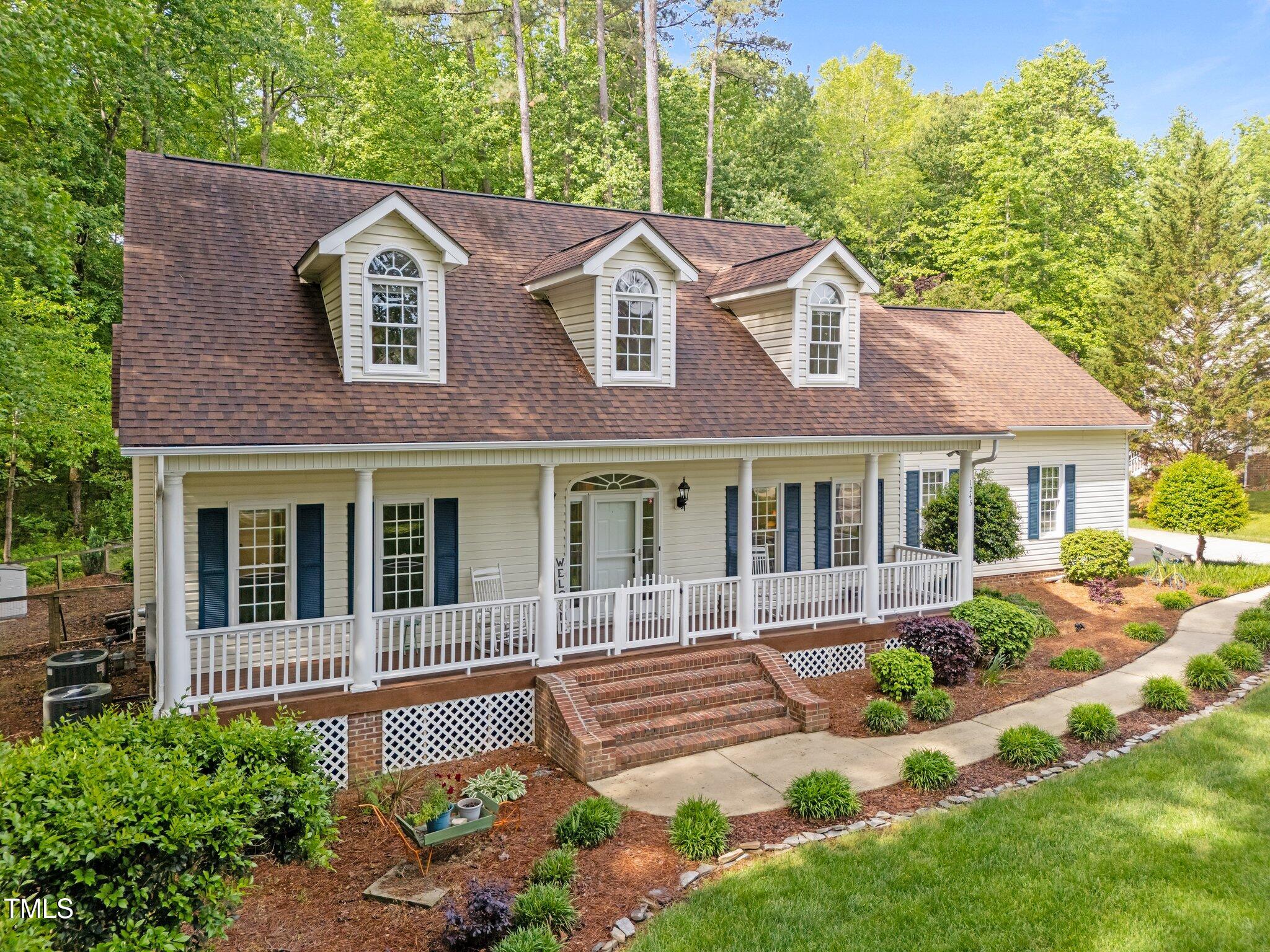 1245 Torchlight Way Raleigh, NC 27603 - Photo 3 of 47 Side entry garage, rocking chair front porch.