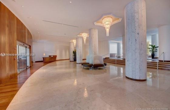5161 Collins Avenue, Unit 715 Miami Beach, FL 33140 - Photo 22 of 31 a view of a living room and kitchen