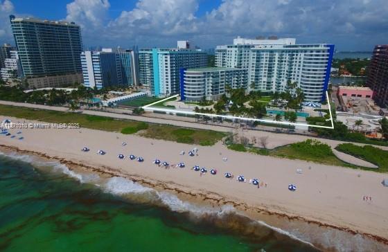 5161 Collins Avenue, Unit 715 Miami Beach, FL 33140 - Photo 29 of 31 a large building with a view of outdoor space