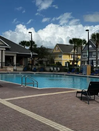 a view of multiple houses with a yard