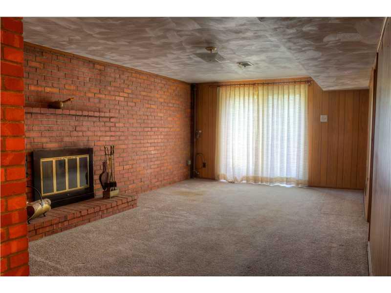 401 McKinney Road Wexford, PA 15090 - Photo 11 of 16 Den/Family/Great Room. this room has a fireplace and a slider to the back yard.