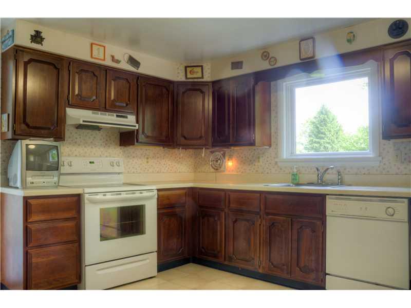 401 McKinney Road Wexford, PA 15090 - Photo 5 of 16 Kitchen. a multitude of cabinetry, dishwasher,range and refrigerator make this a very functional kitchen